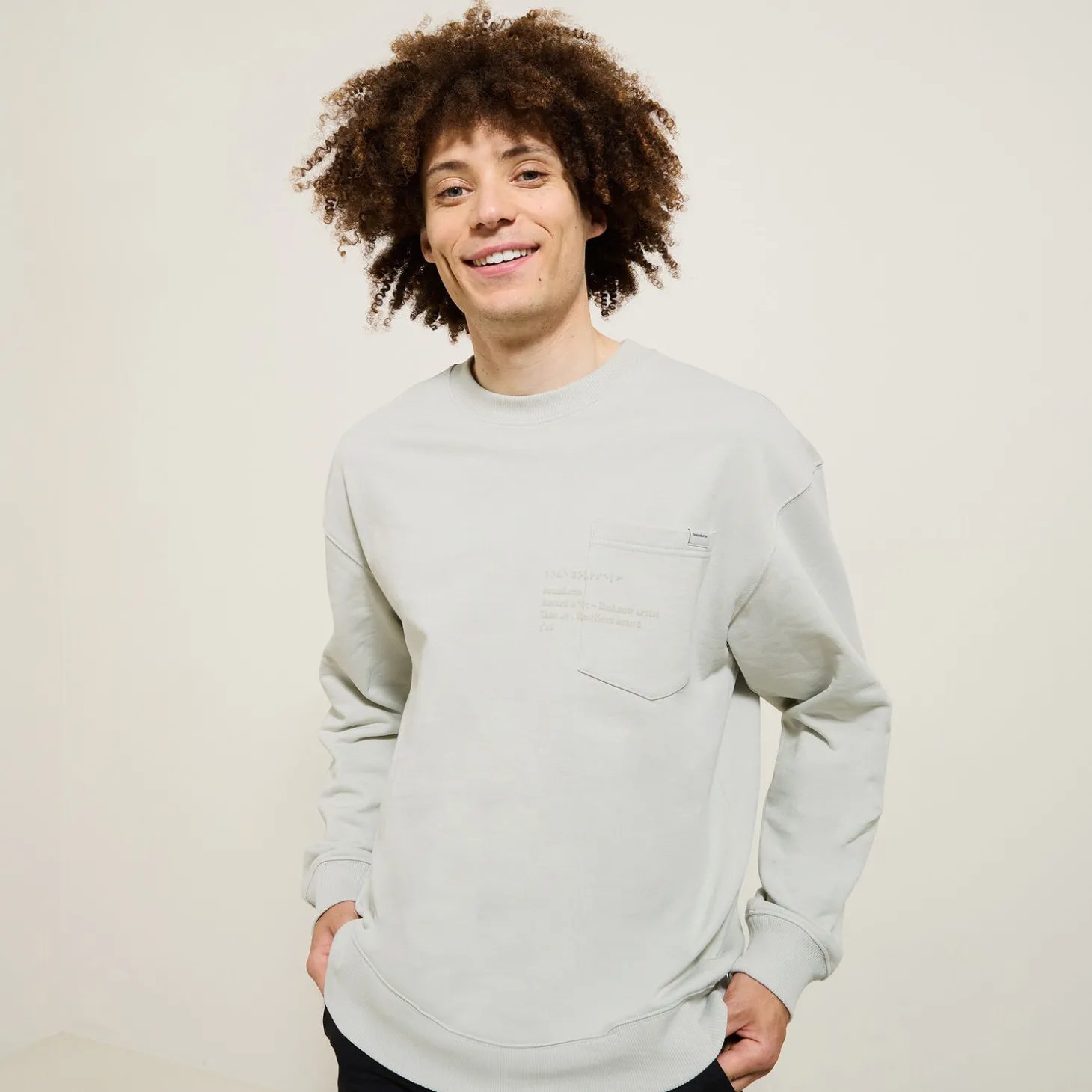 New Sweater ronde hals, zak en afbeelding Sweater